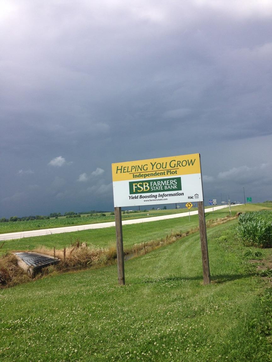 6-15-15 Cloudy Sky behind Sign.jpg